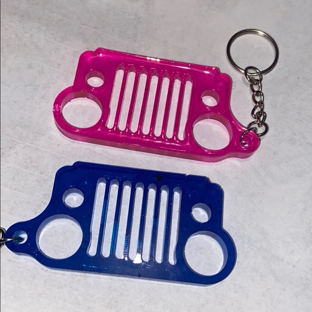 2x jeep grill keychains ! Set of 2